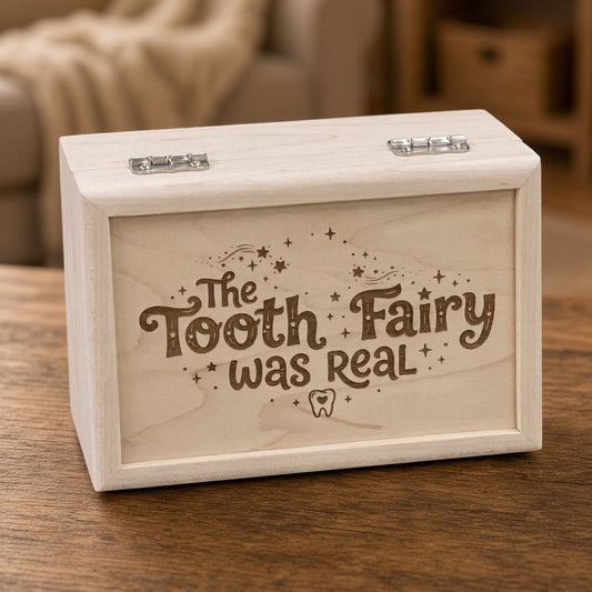 Maple wooden Tooth Fairy box, 6 x 4 x 3, with the lid engraved "The Tooth Fairy was real" with stars and a tooth, and nickel hinges
