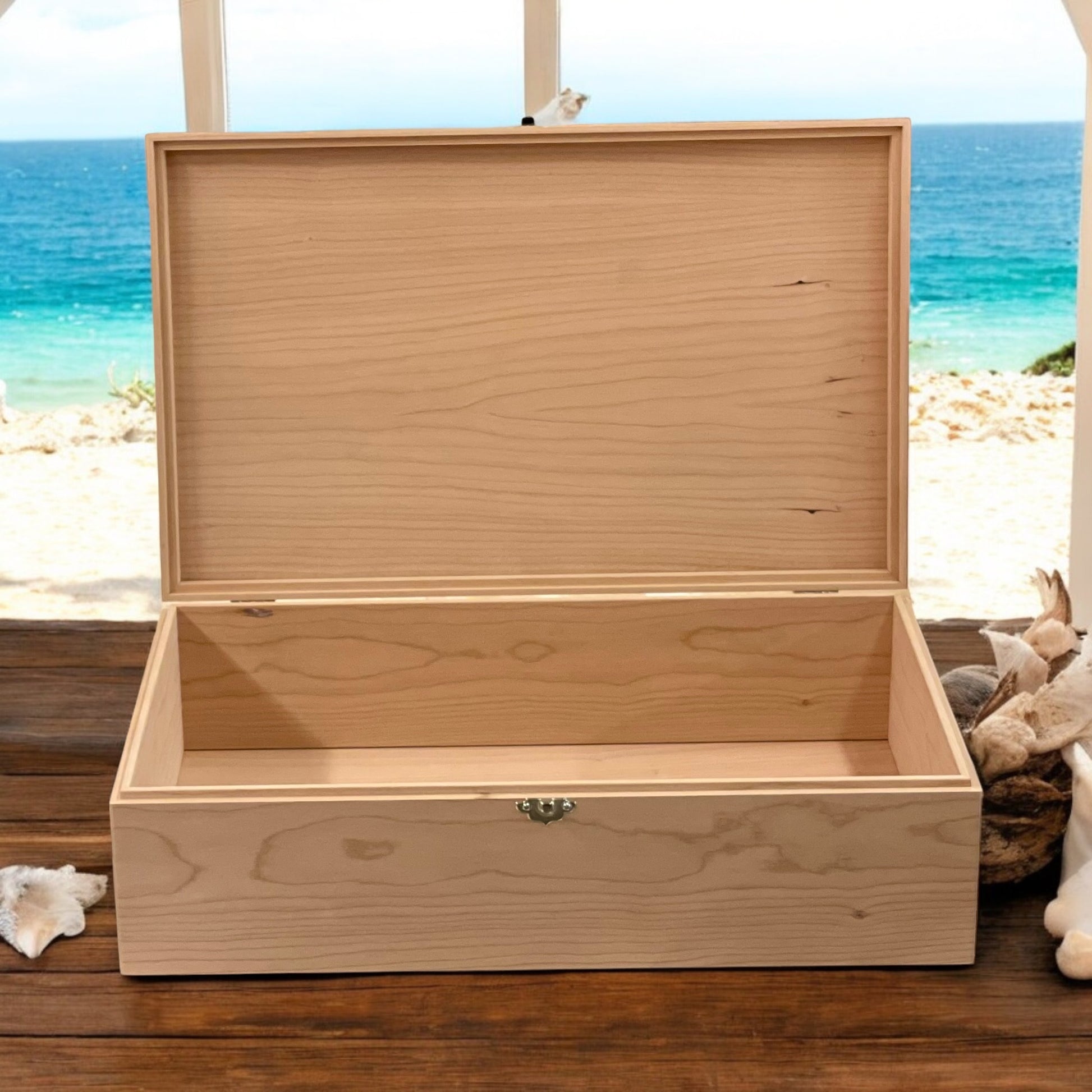 Wooden box on a wooden surface with a beach scene in the background