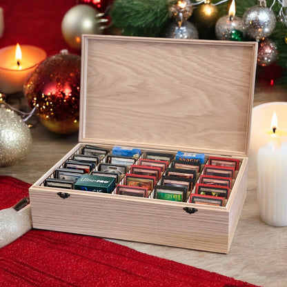 Premium wooden MTG deck box with collectible cards against a festive background with candles and ornaments.